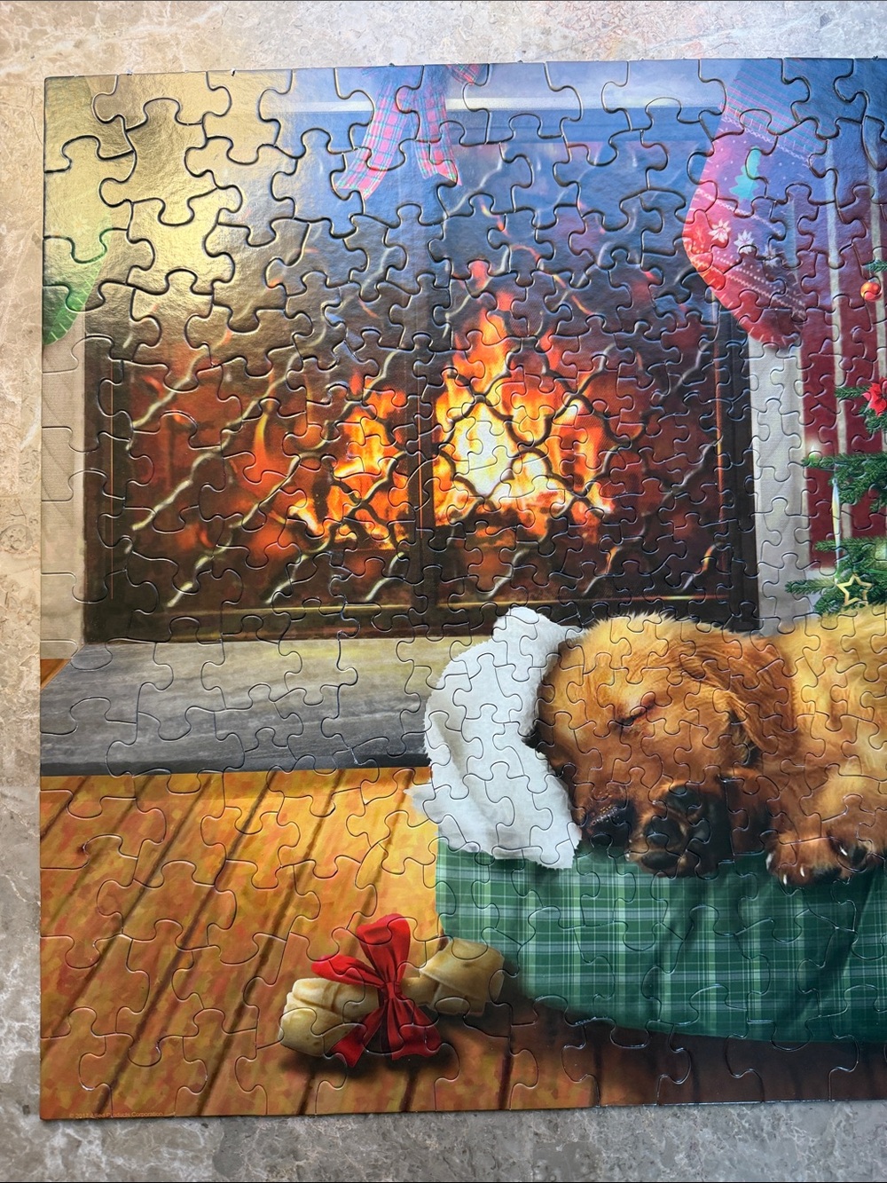Holiday Dog Puzzle featuring Sleeping Puppy in Green Bed - Picture 2 of 7